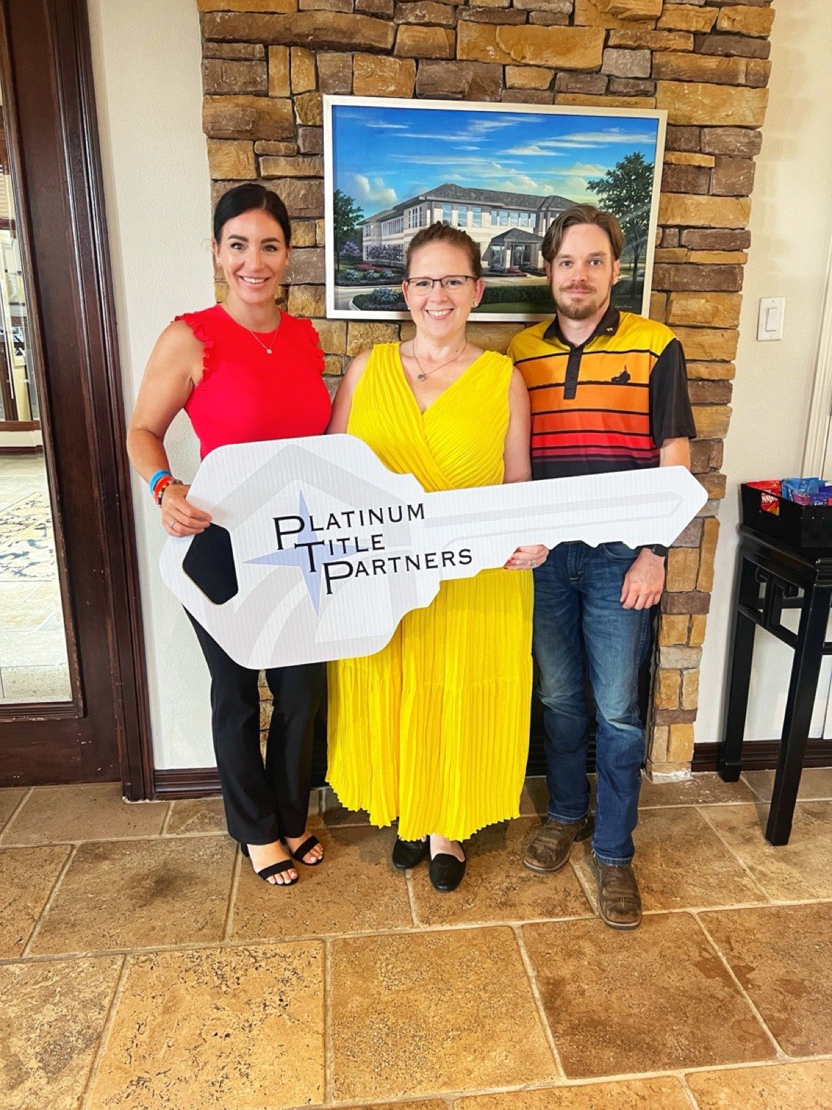Clients receiving the key to their new home